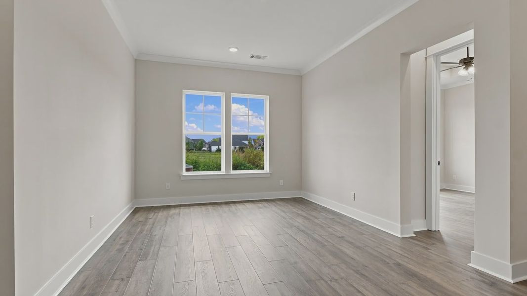 Upstairs spacious area with window.