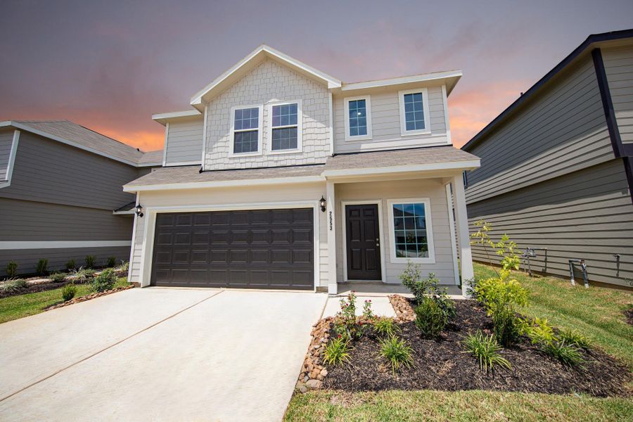 Front exterior of a new home in Cliffstone Hills, Conroe, TX, highlighting curb appeal (Image 2). Front exterior of a new home in Cliffstone Hills, Conroe, TX, highlighting curb appeal (Image 2).