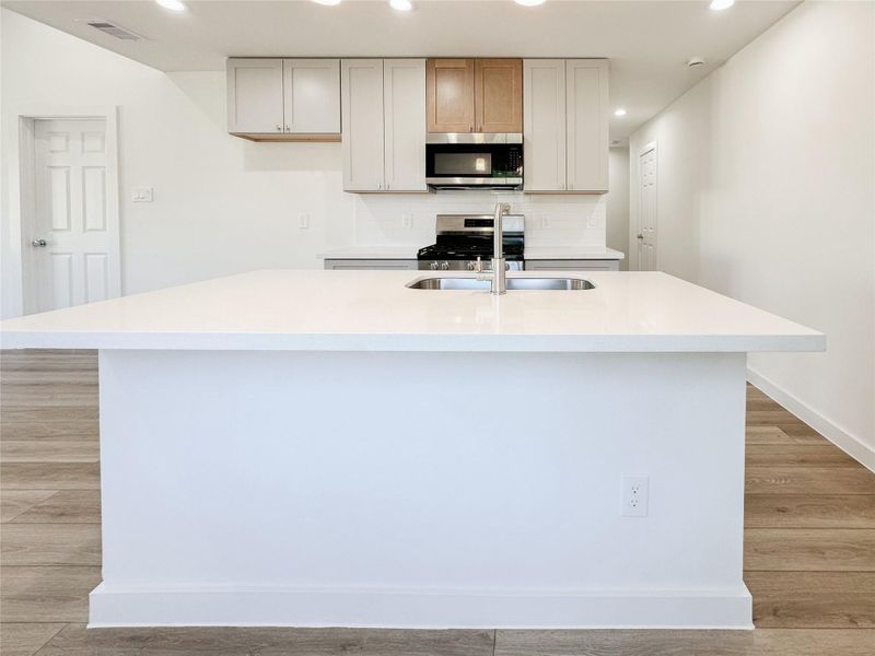 Furnished interior view inside a new home in , Conroe (Image 9).