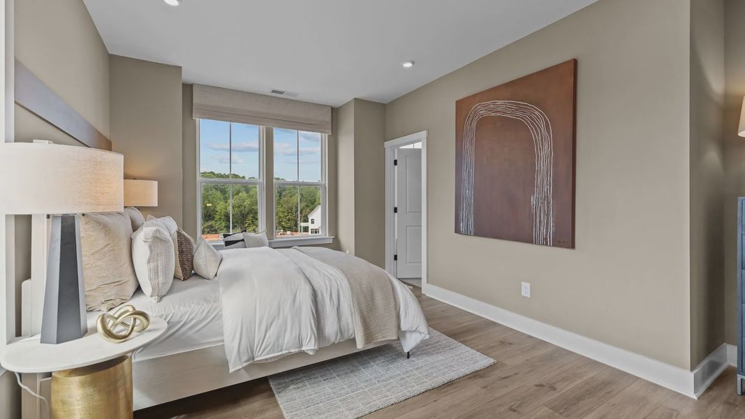 Furnished interior view inside a new home in The River District Townhomes, Charlotte (Image 15). Furnished interior view inside a new home in The River District Townhomes, Charlotte (Image 15).