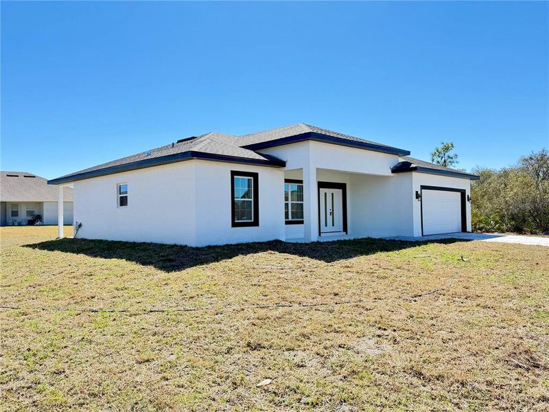 Exterior details and patio area of a home in , Sebring (Image 14).