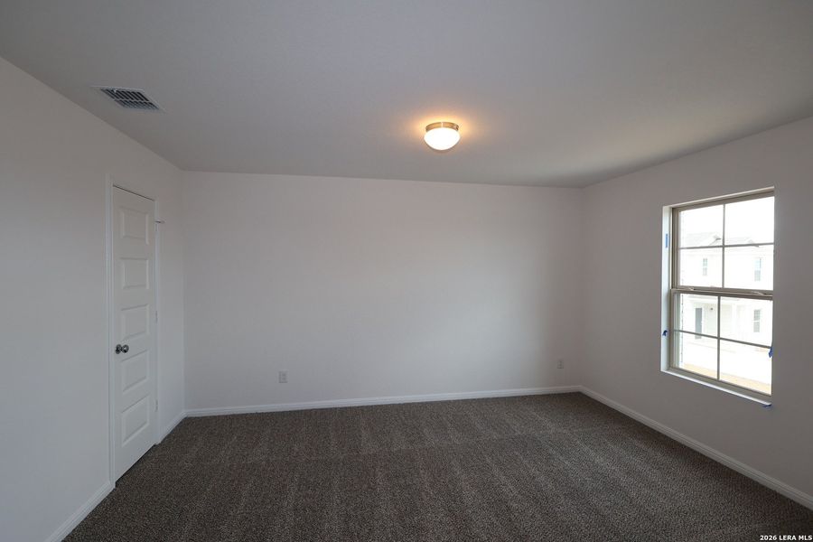 Spacious, unfurnished interior of a new home in Verano Farms, Von Ormy (Image 21).