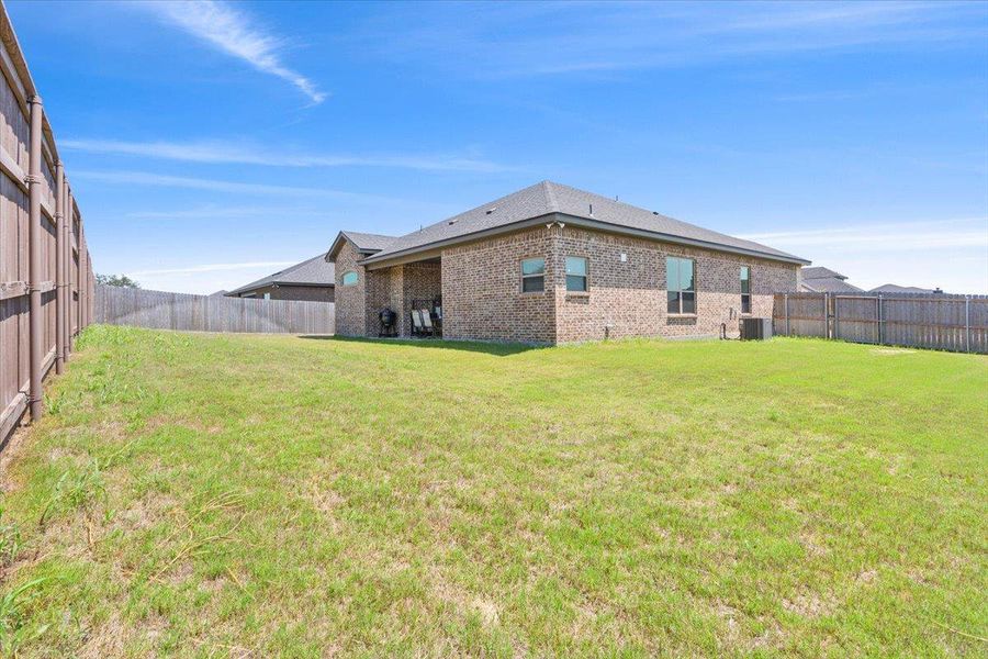 Exterior details and patio area of a home in , Belton (Image 26).