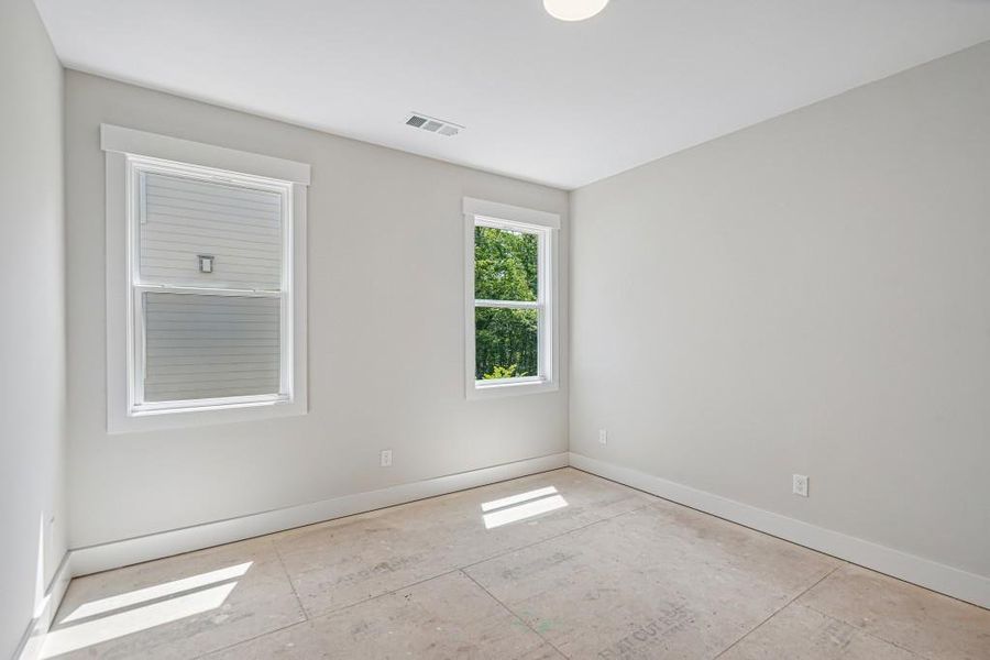 Spacious, unfurnished interior of a new home in Arden on Lanier, Cumming (Image 32).