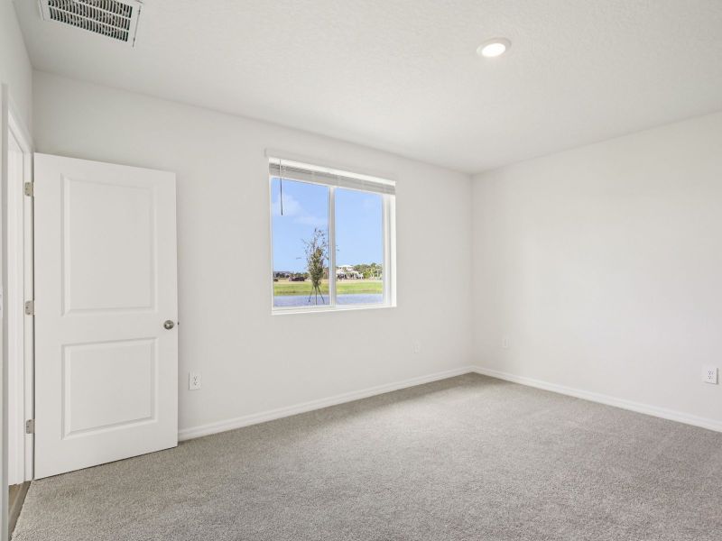 Spacious, unfurnished interior of a new home in Magnolia Bay - Premier Series, Nokomis (Image 12).