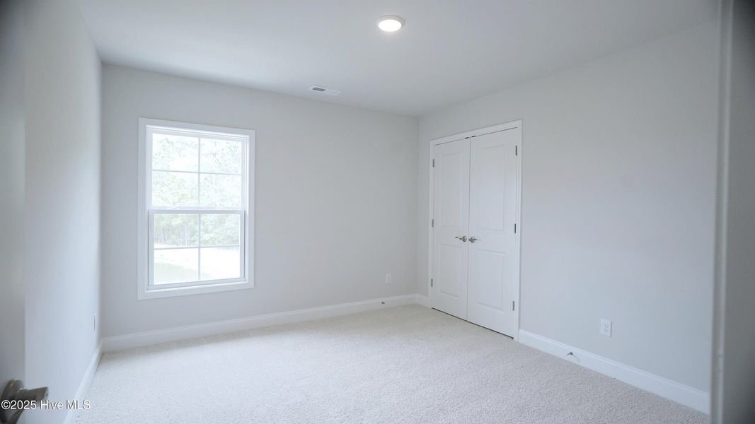 Spacious, unfurnished interior of a new home in Palmetto Creek, Bolivia (Image 20).