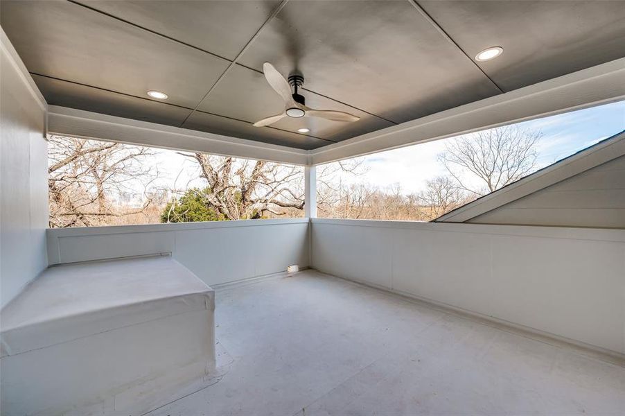 View of patio featuring ceiling fan