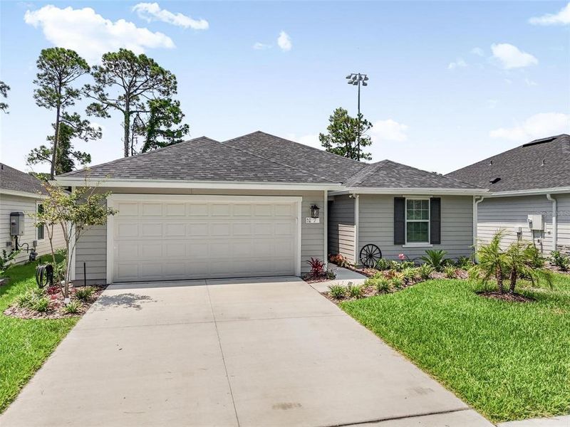 Front exterior of a new home in , Flagler Beach, FL, highlighting curb appeal (Image 23). Front exterior of a new home in , Flagler Beach, FL, highlighting curb appeal (Image 23).