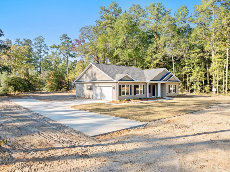 Front exterior of a new home in , Orangeburg, SC, highlighting curb appeal (Image 1). Front exterior of a new home in , Orangeburg, SC, highlighting curb appeal (Image 1).