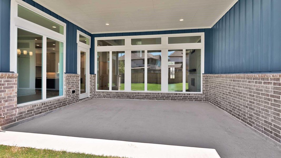 Exterior details and patio area of a home in Fulshear Lakes, Fulshear (Image 4).