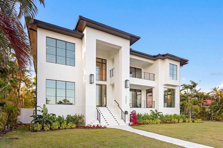 Front exterior of a new home in , St. Petersburg, FL, highlighting curb appeal (Image 26).