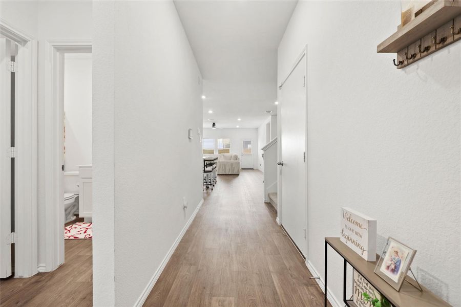 Step inside to a wide foyer that draws you right into the heart of the home, offering a seamless flow into the open-concept living, dining, and kitchen areas!