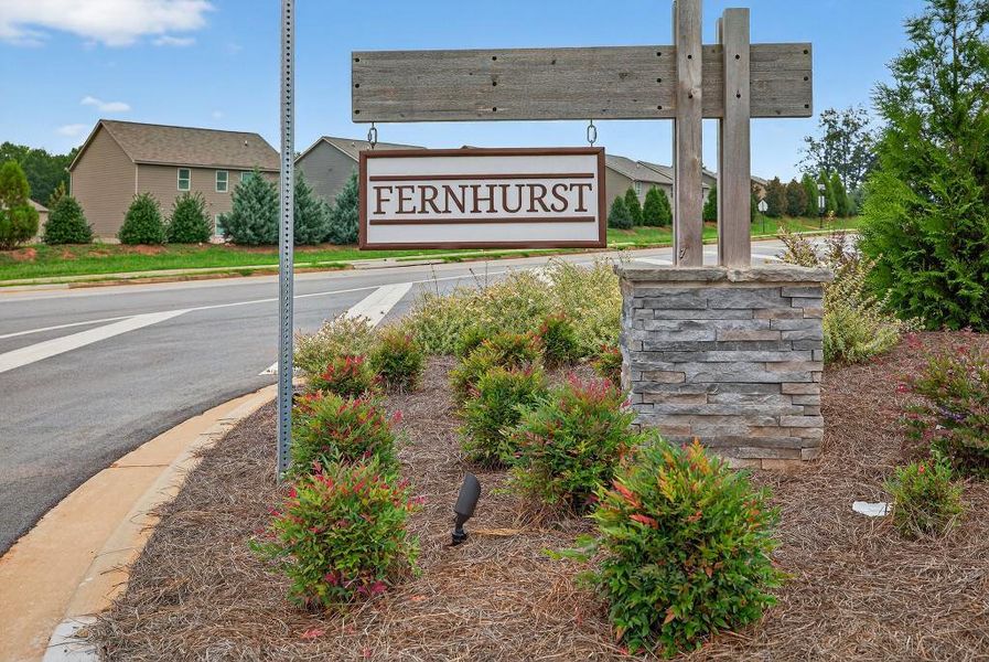 Front exterior of a new home in Fernhurst, McDonough, GA, highlighting curb appeal (Image 17).