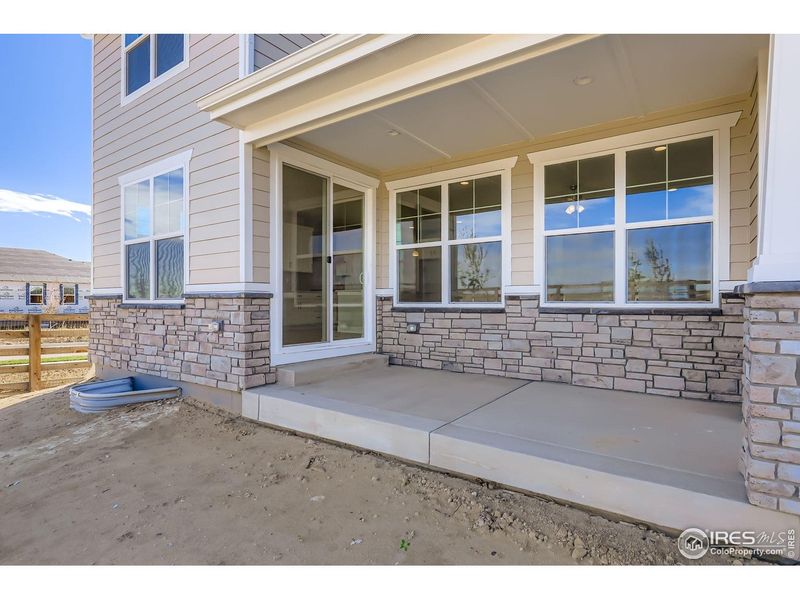 Exterior details and patio area of a home in Barefoot Lakes, Firestone (Image 2). Exterior details and patio area of a home in Barefoot Lakes, Firestone (Image 2).