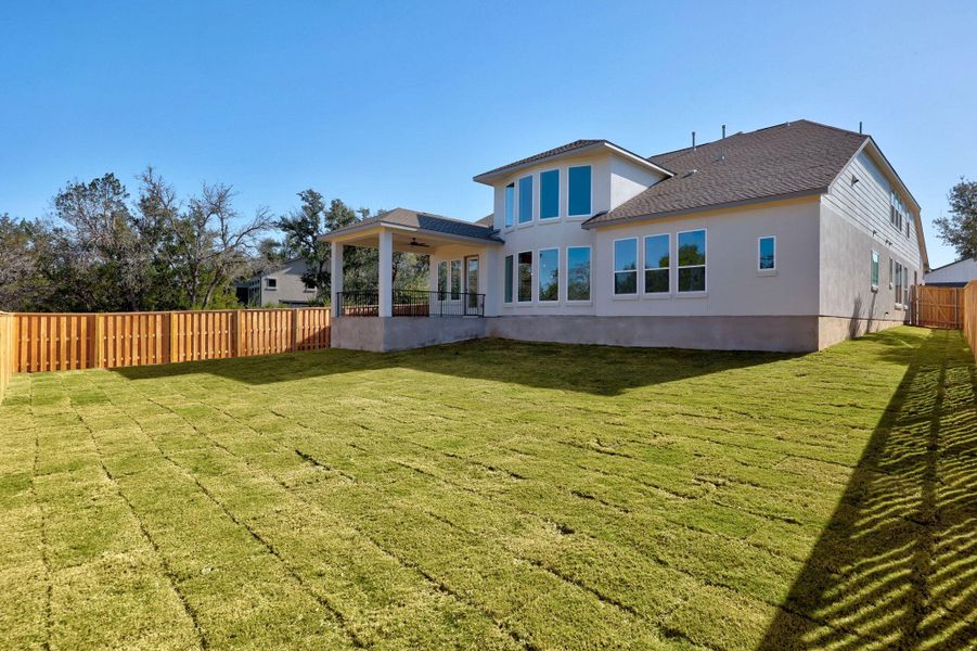 Exterior details and patio area of a home in Parmer Ranch - 60', Georgetown (Image 3).