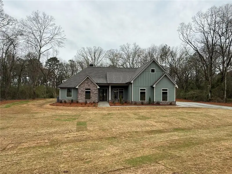 Front exterior of a new home in , Monroe, GA, highlighting curb appeal (Image 2). Front exterior of a new home in , Monroe, GA, highlighting curb appeal (Image 2).