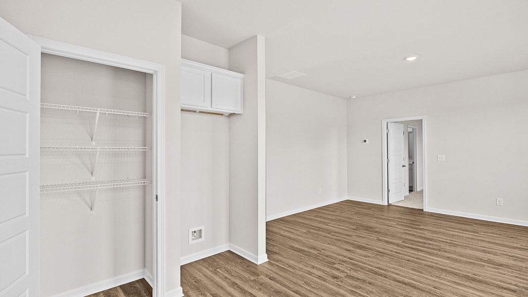 Representative unfurnished interior of a home built from the Edgewood Express - Duplex by D.R. Horton in Remington Chase, Perry (Image 12).