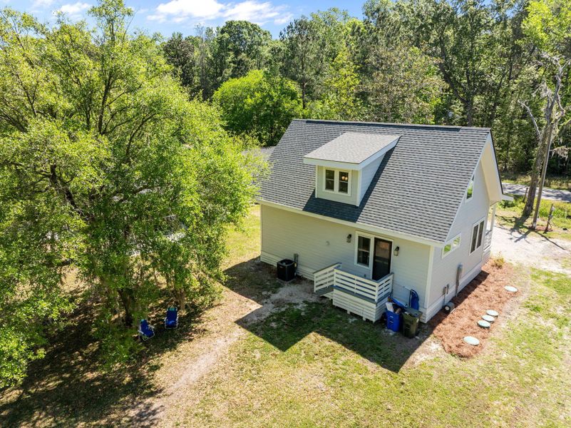 Exterior details and patio area of a home in , Johns Island (Image 21).