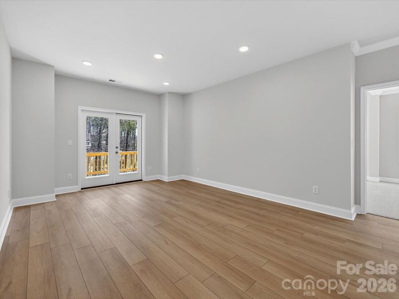 Spacious, unfurnished interior of a new home in North Creek Village, Huntersville (Image 40).