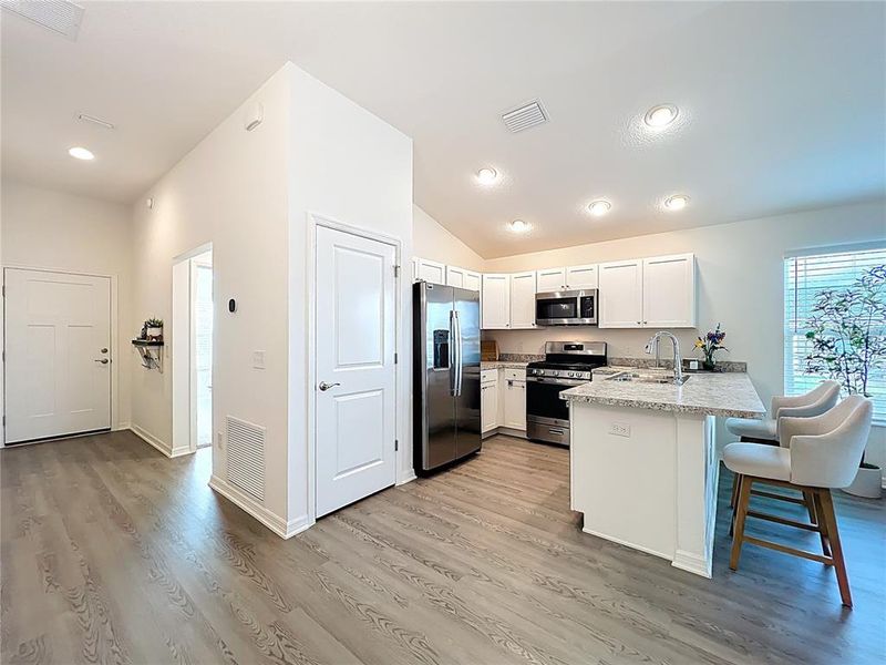 Furnished interior view inside a new home in , The Villages (Image 14).