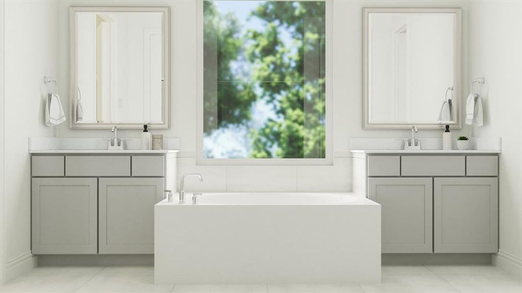 Bathroom featuring double vanity, a bathing tub, and tile patterned flooring