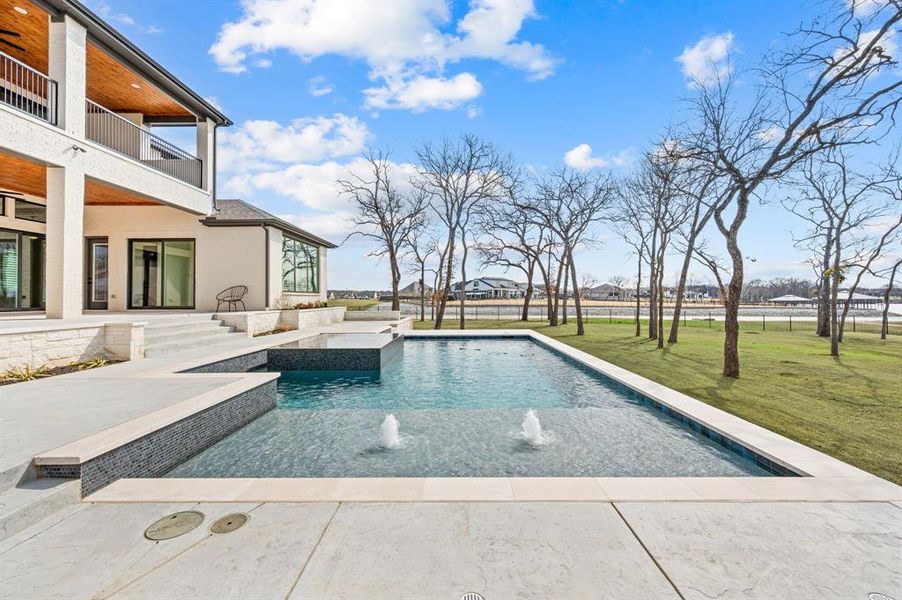 Exterior details and patio area of a home in The Resort on Eagle Mt. Lake, Fort Worth (Image 23).