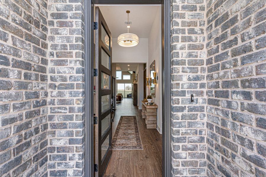 Exterior details and patio area of a home in Lariat, Liberty Hill (Image 37).