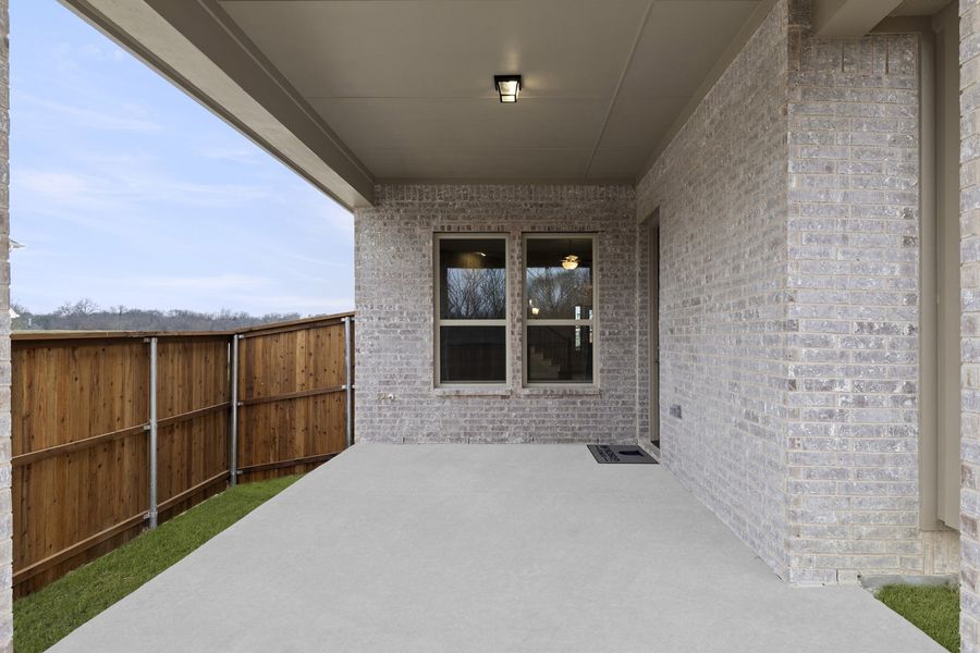 Exterior details and patio area of a home in Providence Cove, McKinney (Image 3). Exterior details and patio area of a home in Providence Cove, McKinney (Image 3).