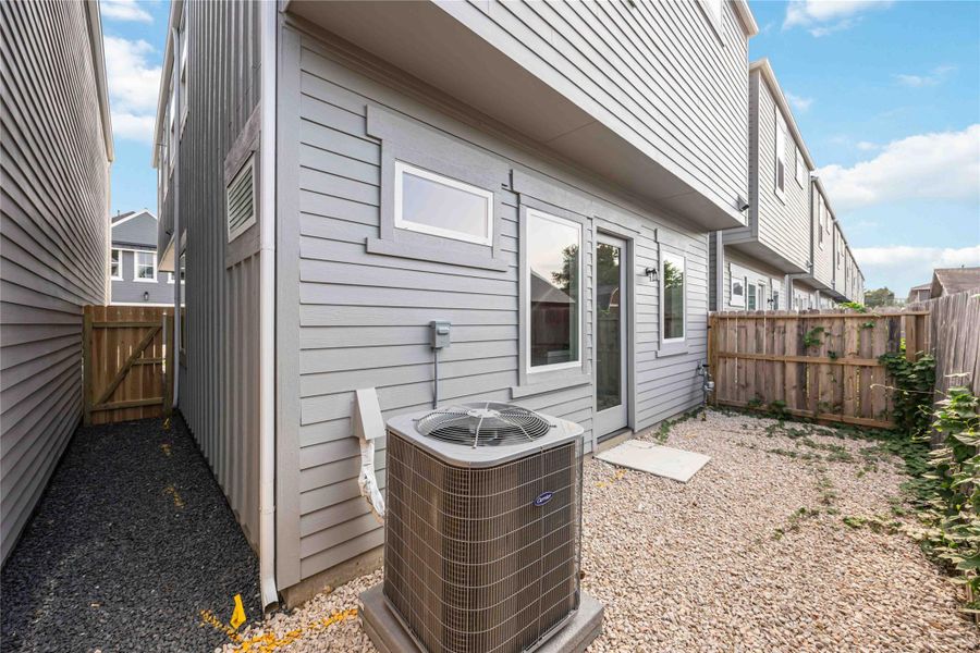 Exterior details and patio area of a home in , Houston (Image 3).
