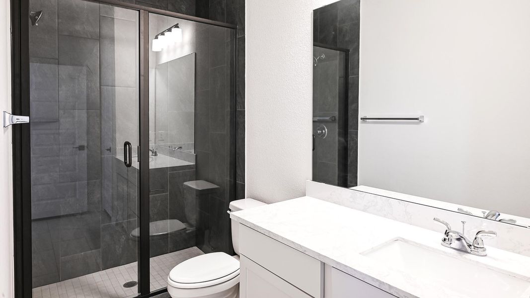 Furnished interior view inside a new home in 6 Creeks, Kyle (Image 13).