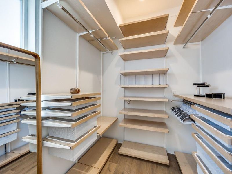 Walk in customized closet with heated towel warmer