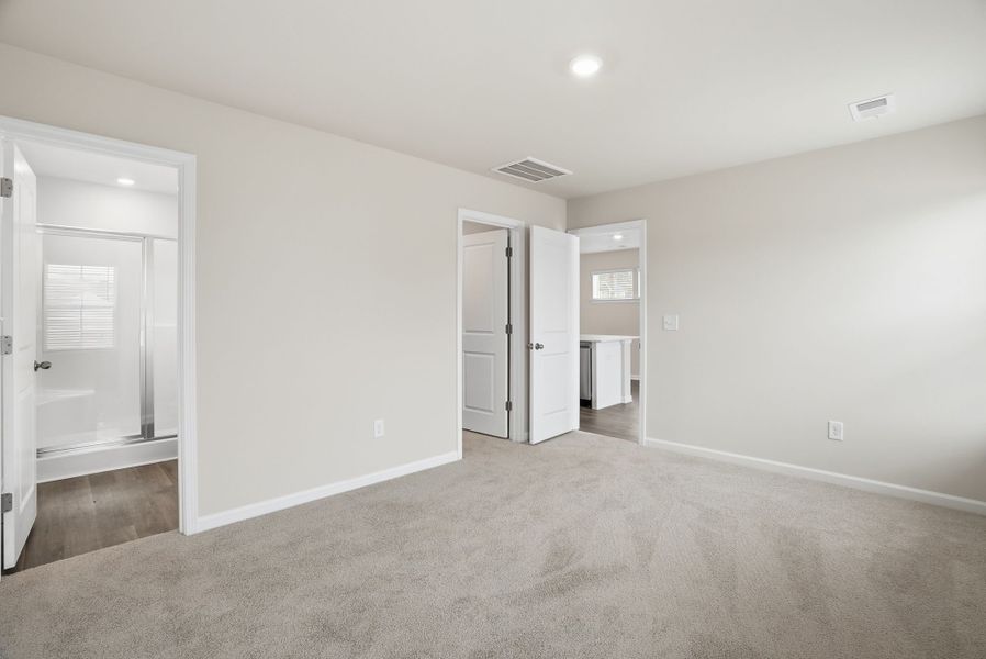 Representative unfurnished interior of a home built from the Juniper B by McGuinn Homes in Hunters Branch, Hopkins (Image 36).