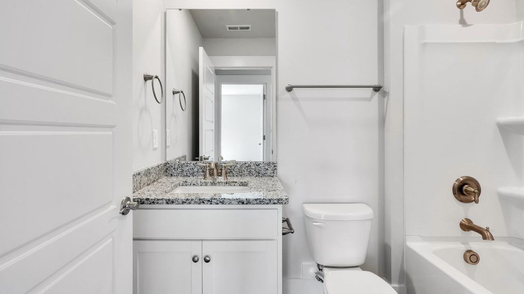 Furnished interior view inside a new home in The Pines at Blake Farm, Wilmington (Image 12).