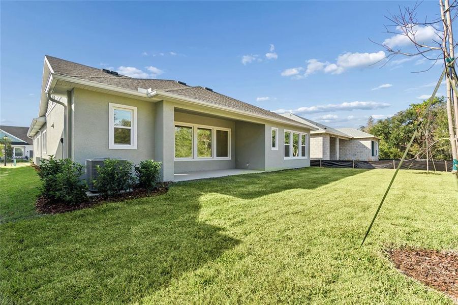 Exterior details and patio area of a home in Chapel Crossings, Wesley Chapel (Image 21).