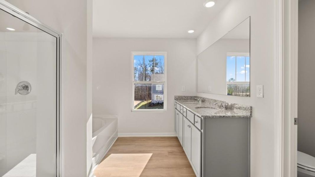 Furnished interior view inside a new home in Northwoods at Mirror Lake, Villa Rica (Image 8).