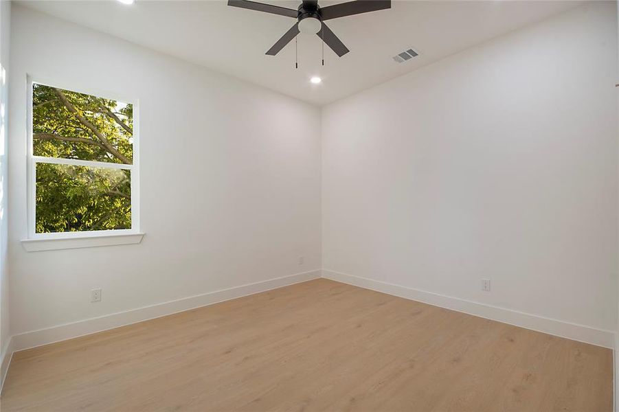 Unfurnished room featuring wood finished floors, recessed lighting, and ceiling fan