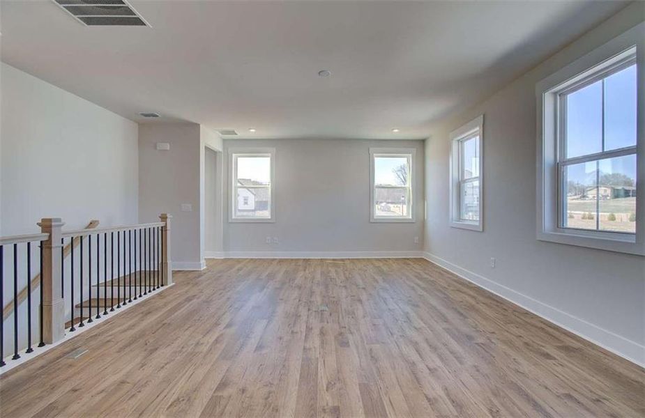 Spacious, unfurnished interior of a new home in The Paddocks at Doc Hughes, Buford (Image 37).