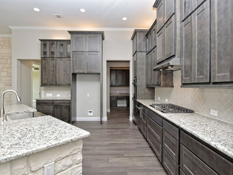 Representative furnished interior of a home built from the San Simeon II by Giddens Homes in Clearwater Ranch, Liberty Hill (Image 7).