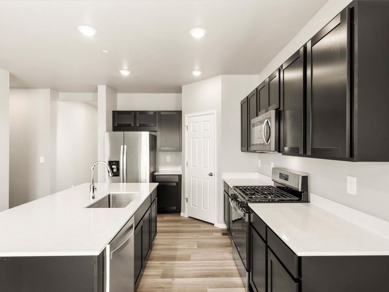 Furnished interior view inside a new home in Buffalo Highlands: The Flora Collection, Commerce City (Image 4).