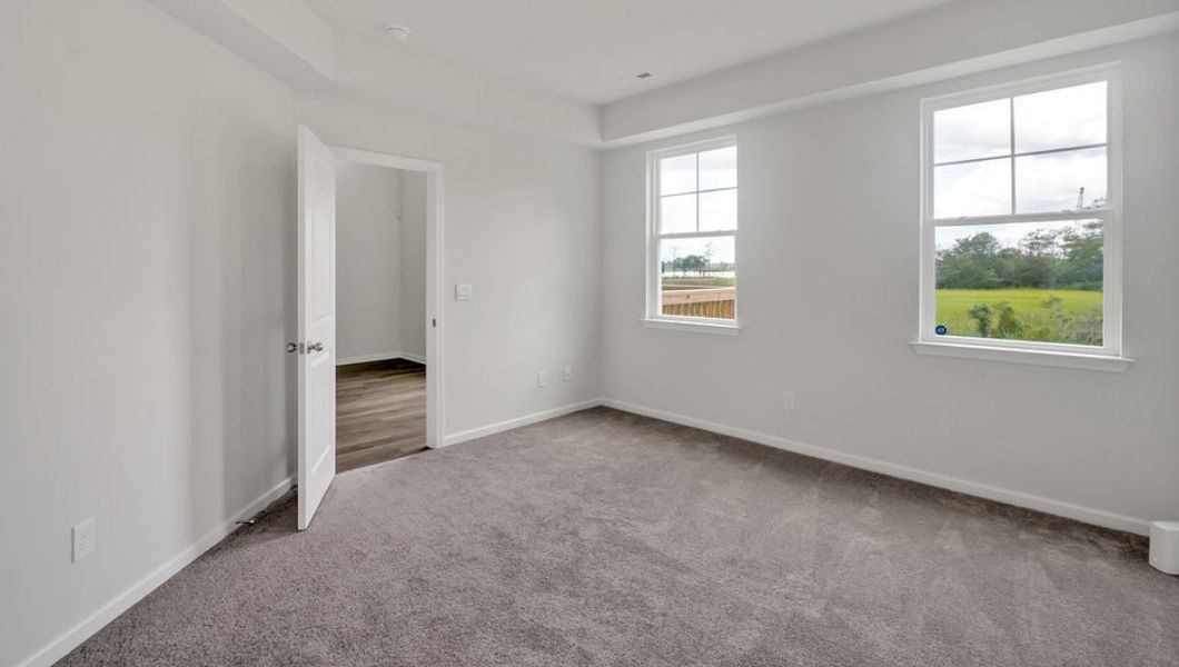 Spacious, unfurnished interior of a new home in Indigo Preserve Townhomes, Leland (Image 15).