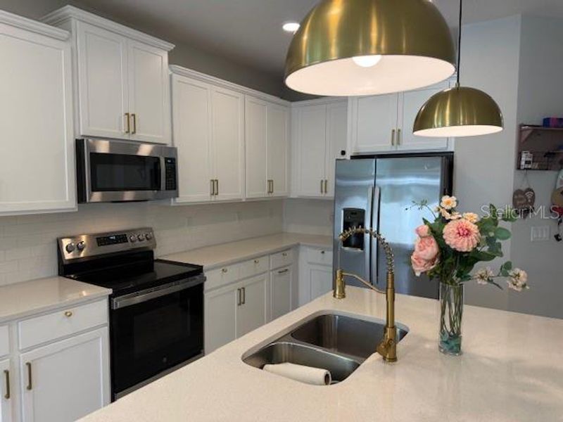 Furnished interior view inside a new home in , Winter Garden (Image 49).