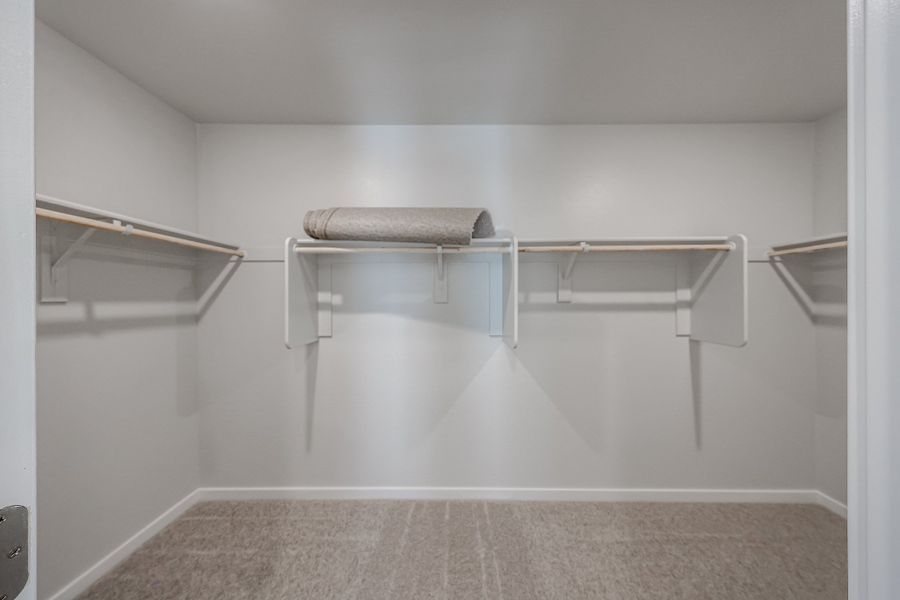 A white room with a grey floor. A white room with a grey floor.