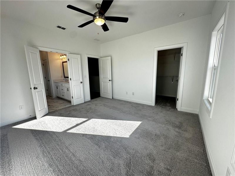 Owners suite features large walk in closet and French Doors leading to Bathroom