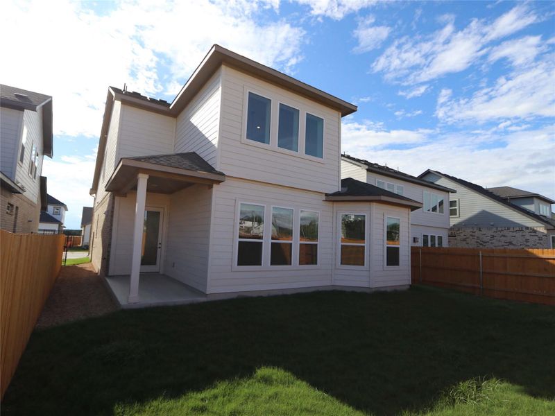 Exterior details and patio area of a home in Estancia West, Manchaca (Image 21). Exterior details and patio area of a home in Estancia West, Manchaca (Image 21).