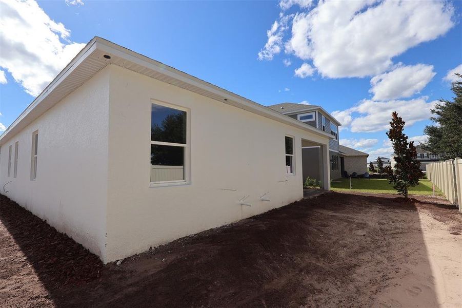 Exterior details and patio area of a home in Bay Lake Farms, St. Cloud (Image 4).