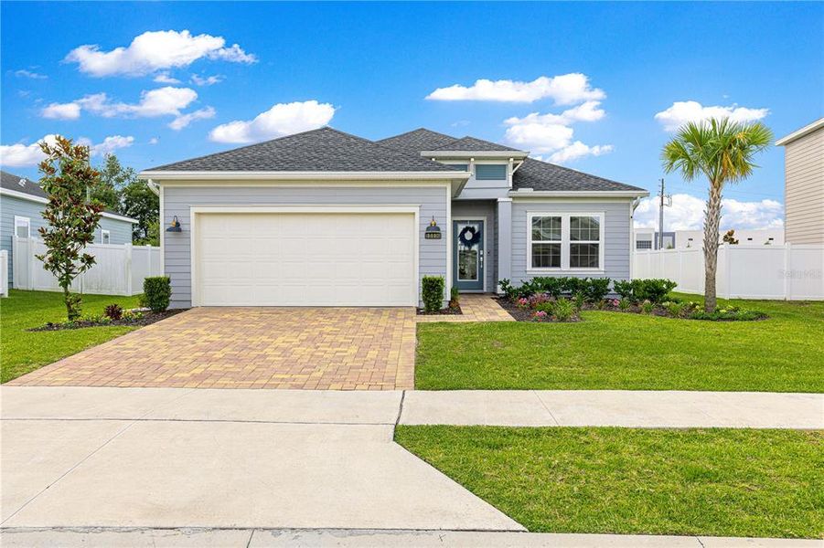 Front exterior of a new home in , Ocala, FL, highlighting curb appeal (Image 26).