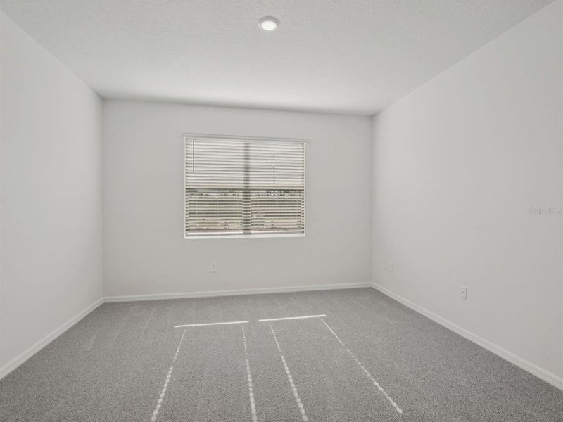 Spacious, unfurnished interior of a new home in Coasterra - Reserve Series, Palmetto (Image 18).