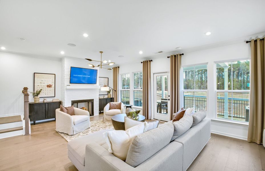 Furnished interior in a model home at Ansley Towns in Cumming (Image 6).
