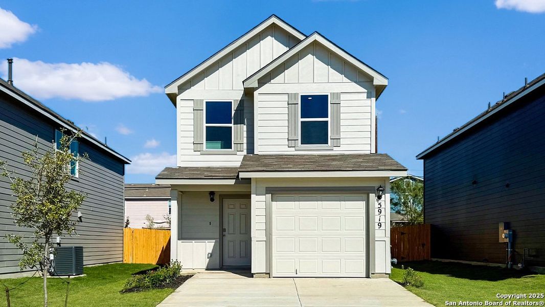 Front exterior of a new home in Blue Ridge Ranch, San Antonio, TX, highlighting curb appeal (Image 2). Front exterior of a new home in Blue Ridge Ranch, San Antonio, TX, highlighting curb appeal (Image 2).