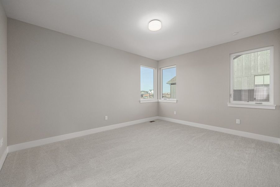 Spacious, unfurnished interior of a new home in West Grange, Longmont (Image 32).